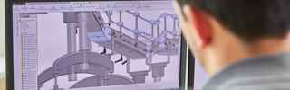 Entwicklung und Konstruktion von schlüsselfertiger Fördertechnik mit CAD am Computer